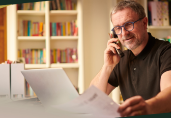 business-owner-reviewing-legal-documents-on-phone