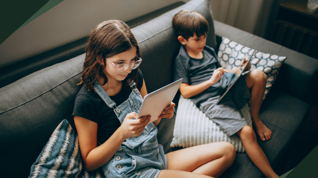 data-privacy-with-children-featuring-two-siblings-holding-ipads